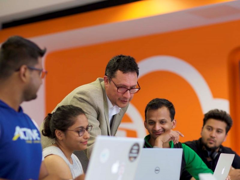 Lecturer teaching students in the Cloud Competency Centre at NCI